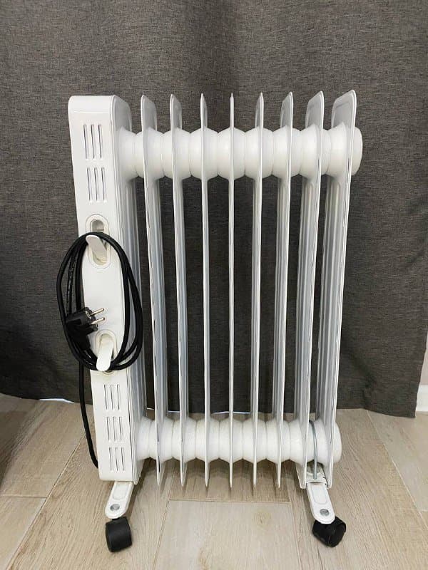 Масляный обогреватель Gorenje на колесах 2