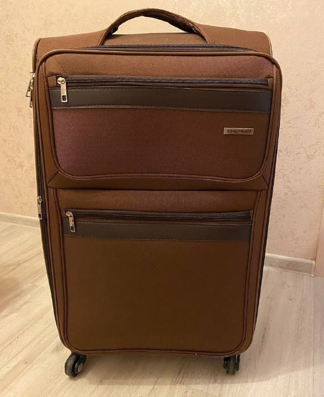 Большой чемодан на колесиках L или XL