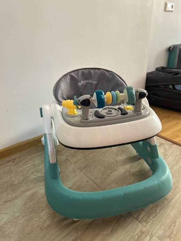 Детские ходунки-каталка с игровой панелью 1