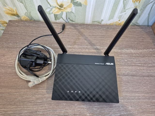 Wi-Fi роутер ASUS RT-N12E С1 чёрный б/у
