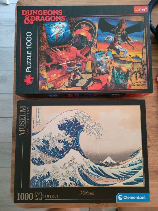 Две коробки пазлов на 1000 деталей