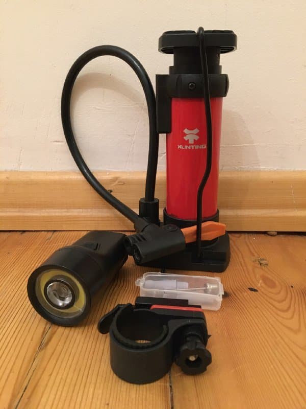 Насос велосипедный, фонарь, сумка, плавки, горнолыжные штаны, карабин с компасом 2