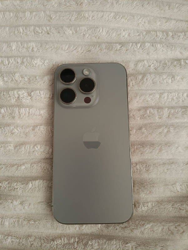 iPhone 15 pro 128 Гб титан 2