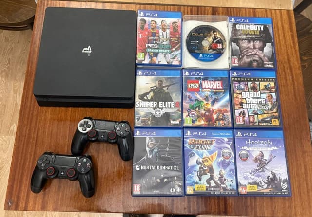 PS4 Slim 1TB, два геймпада, 9 игр