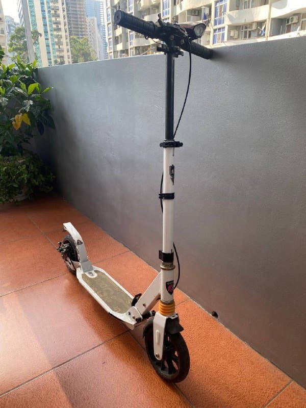 Самокат с амортизаторами и дисковым тормозом