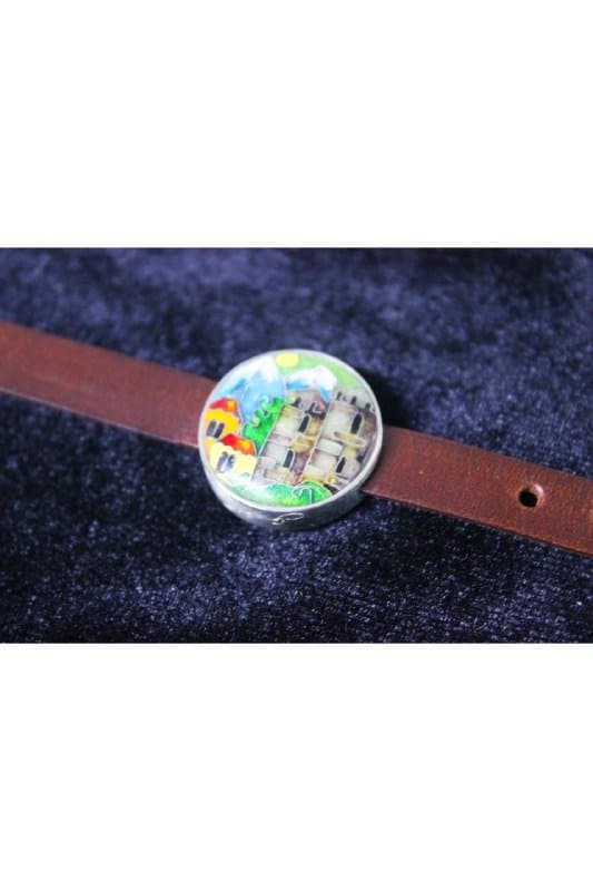 Натуральные кожаные браслеты с серебряными кулонами