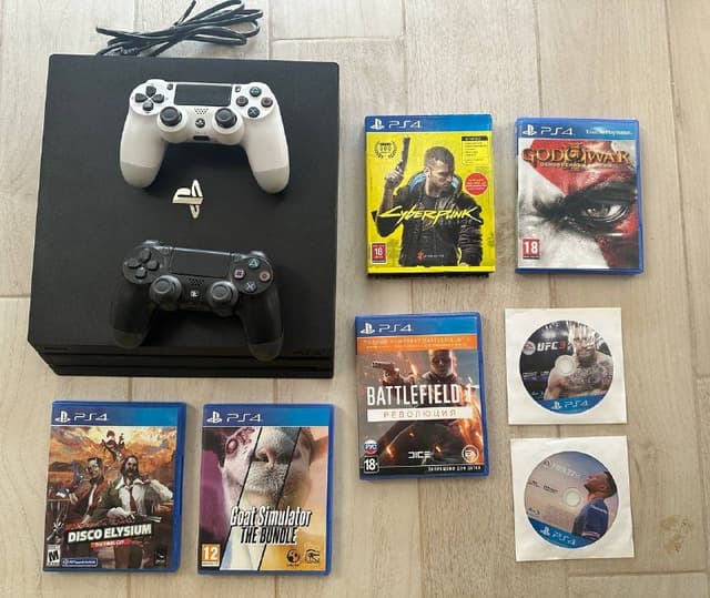 Sony Playstation PS4 Pro 1Tb, 2 джойстика, 7 дисков с играми