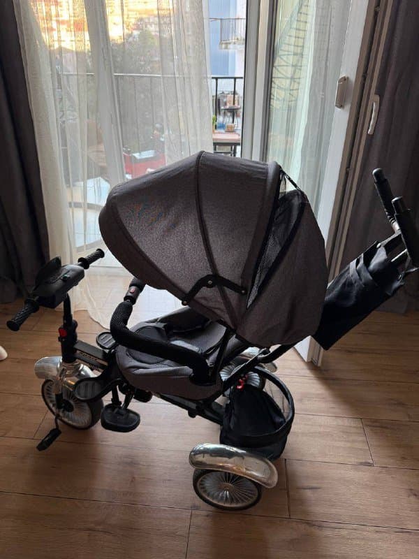 Детский трехколесный велосипед с откидным сиденьем