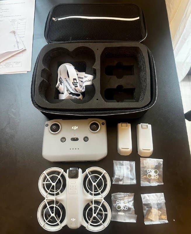 DJI Neo дрон с контроллером, аккумуляторами, сумкой и пропеллерами 2