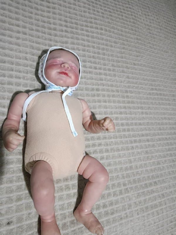 Игрушка - кукла малыша